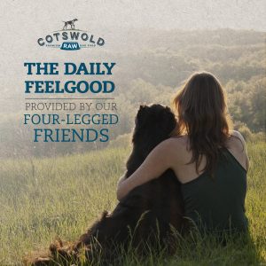 Women and dog in field